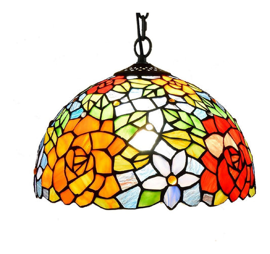 Luminaire Ambre et Rose a silhouette graphique de type suspension